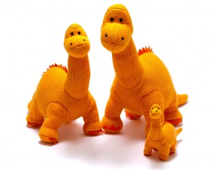 large dinosaur toy, knitted orange diplodocus