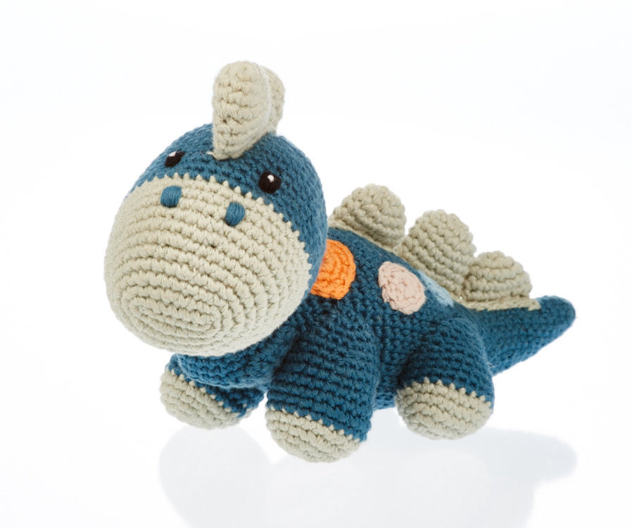 organic baby dinosaur toy in petrol blue with orange dots and pale cream spine and nose